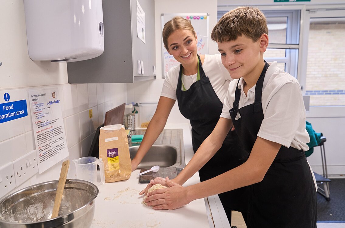 child preparing pastry