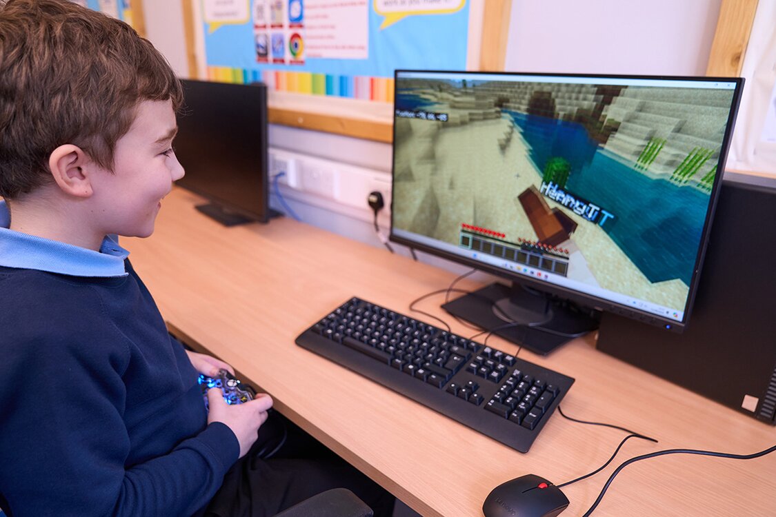 child playing computer game