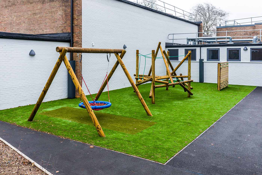 outdoor play equipment on a safety floor
